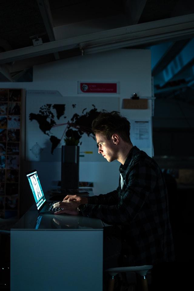 Man sitting in front of a computer